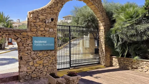 Gate main entrance Hotel Occidental Pueblo Acantilado