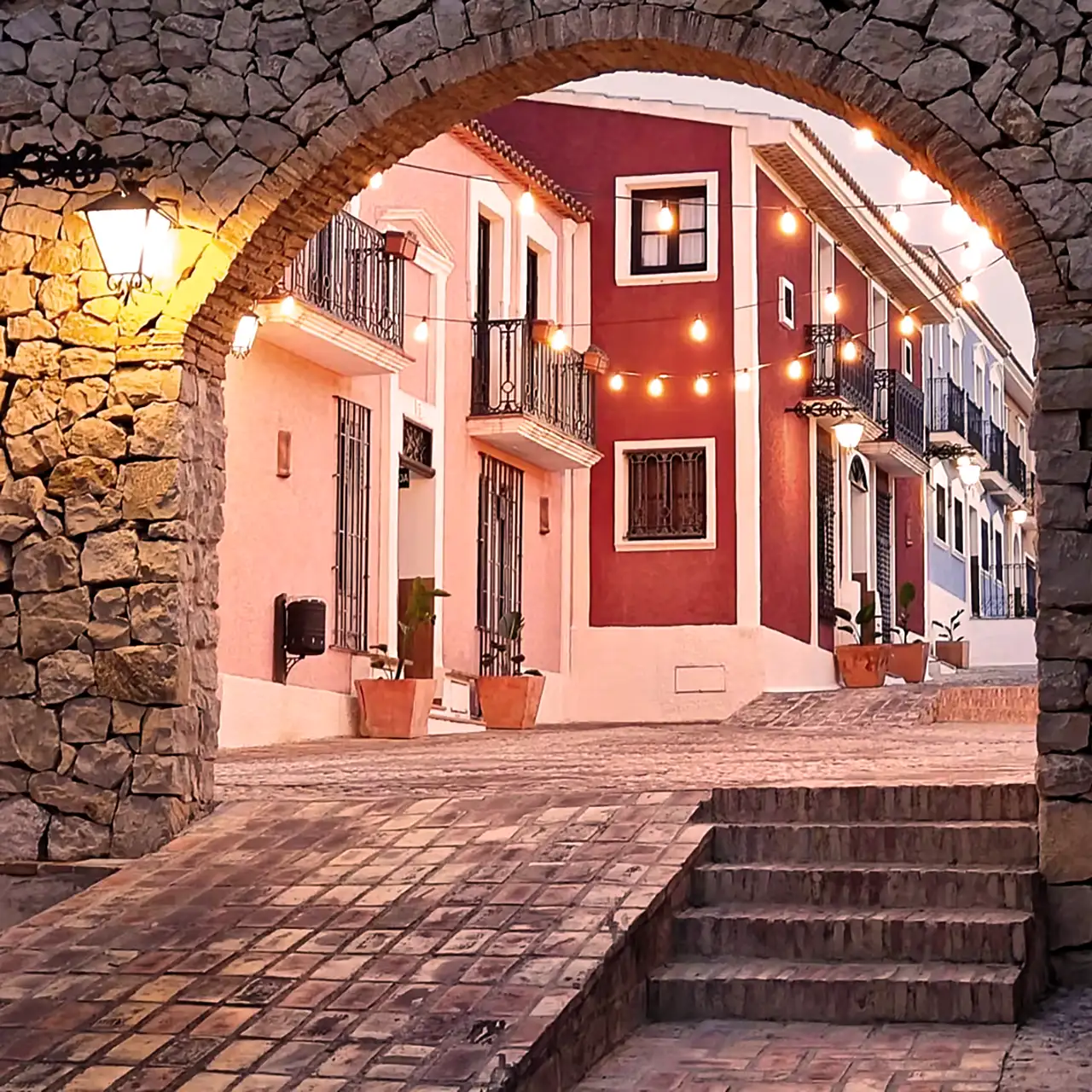 Hotel Occidental Pueblo Acantilado Iberia Experience 2026 towards the pool, old stone gate